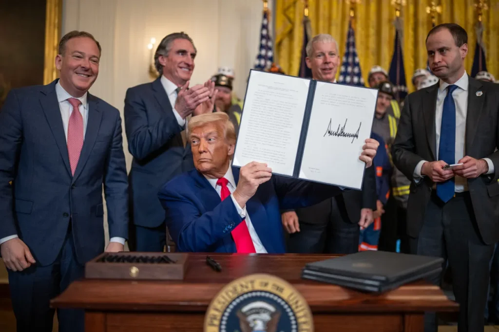 President Trump signs an executive order with EPA director Lee Zeldin